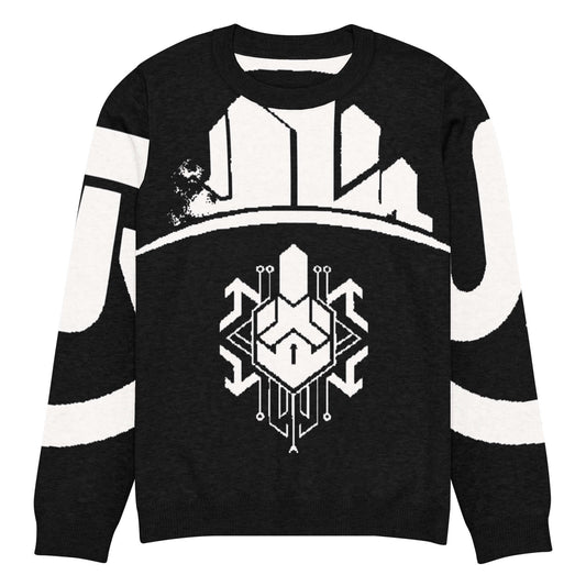 Knitted crew neck sweater featuring a bold geometric design in black and white, perfect for a stylish look.